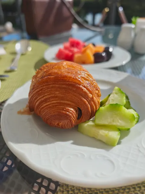 A delightfully buttery chocolate pastry with fresh cucumber.