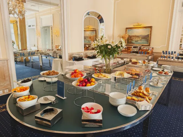 A wonderfully fresh selection of fruit and pastries.